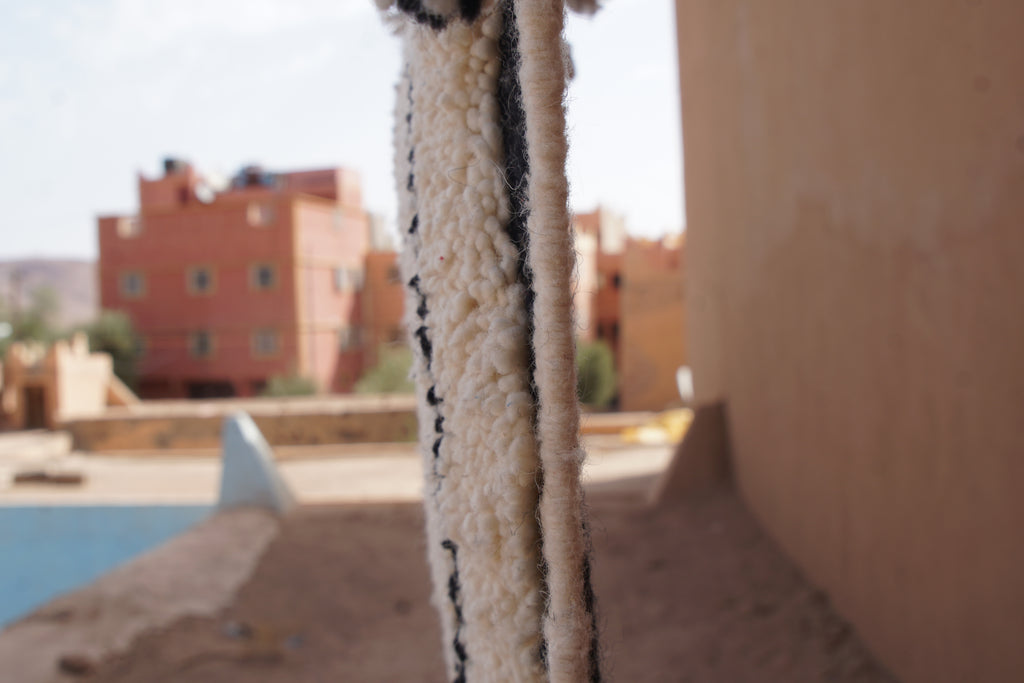 MINIINIMALIST BENI OURAIN MOROCCAN RUG- BLACK IVORY WOOL PIECE